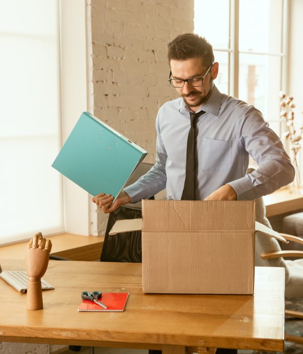 An Employee Packing his Office Stuff Himself