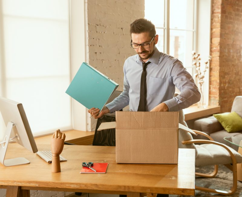 An Employee Packing his Office Stuff Himself