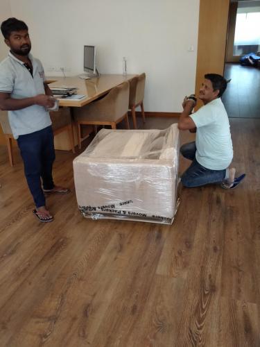 Packing of Sofa at Office Relocation by Delegate Movers and Packers